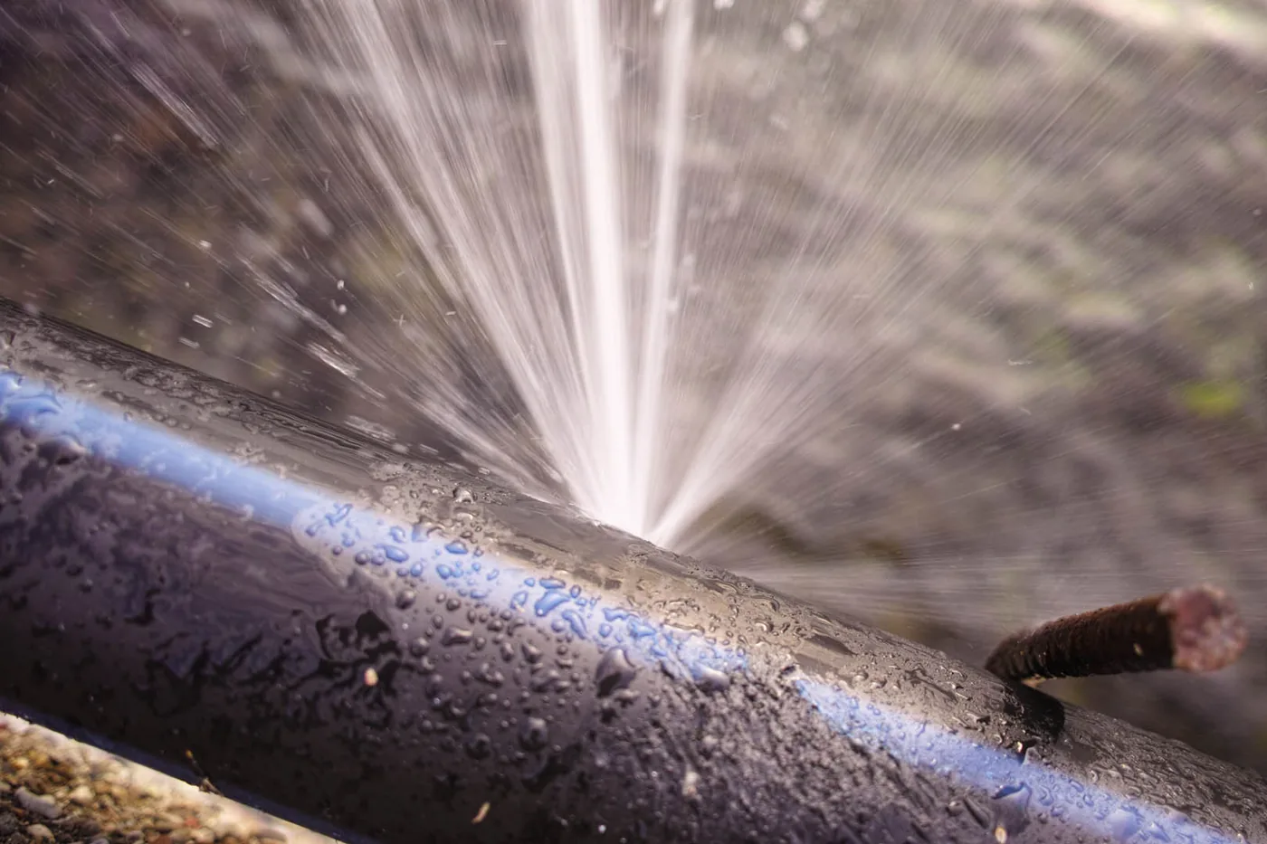 Water spraying from a burst pipe