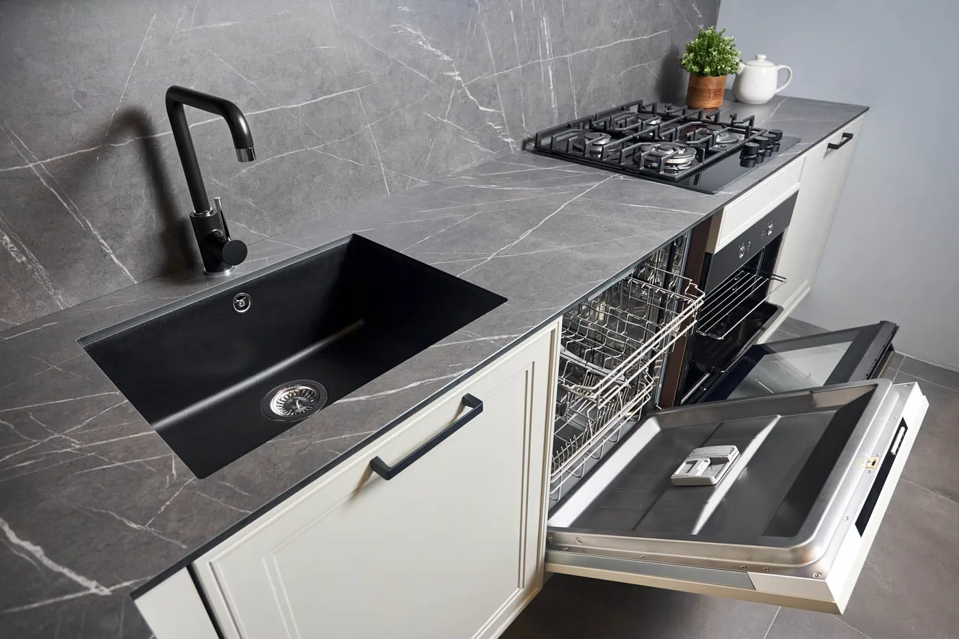 Kitchen sink and dishwasher plumbing during a fit-out