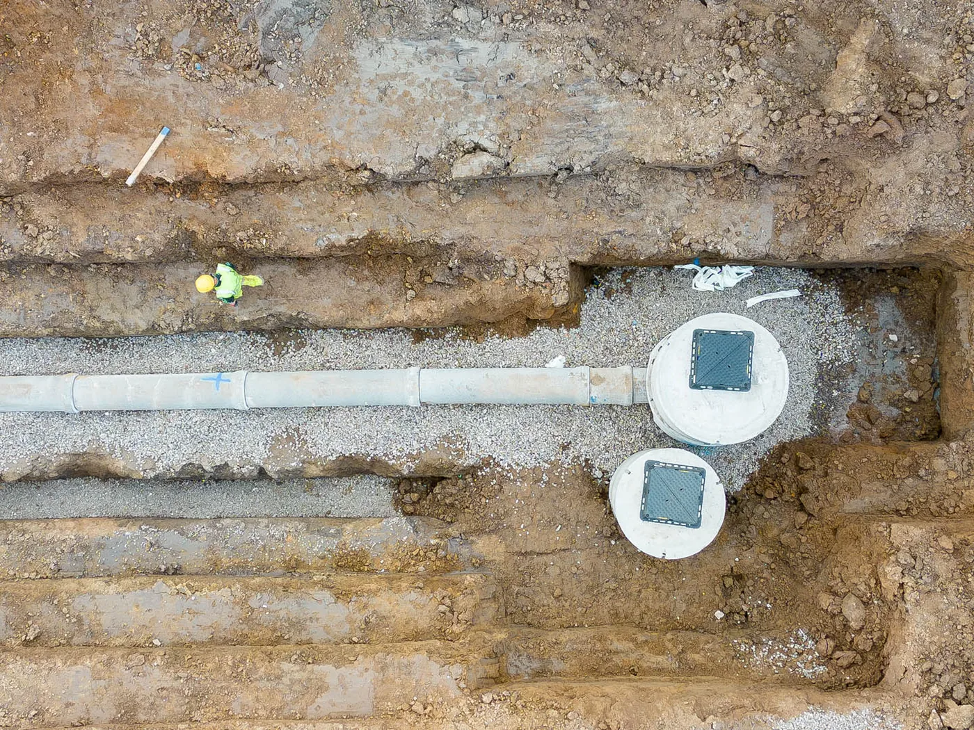 Stormwater pit being set in a trench
